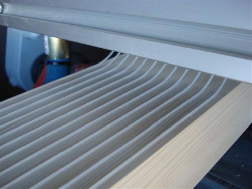 Glulam (madera laminada encolada) con adhesivo Loctite Purbond en Fluid-Bags